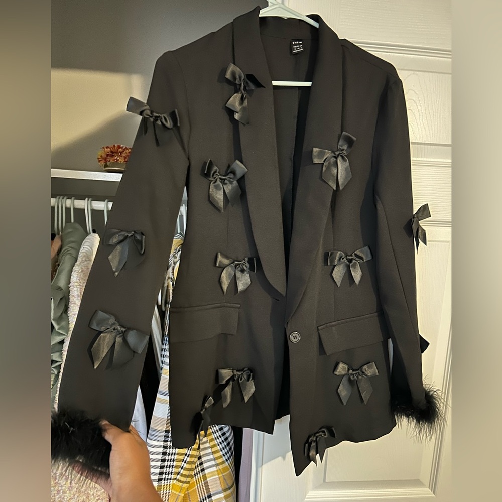 Black blazer with bows